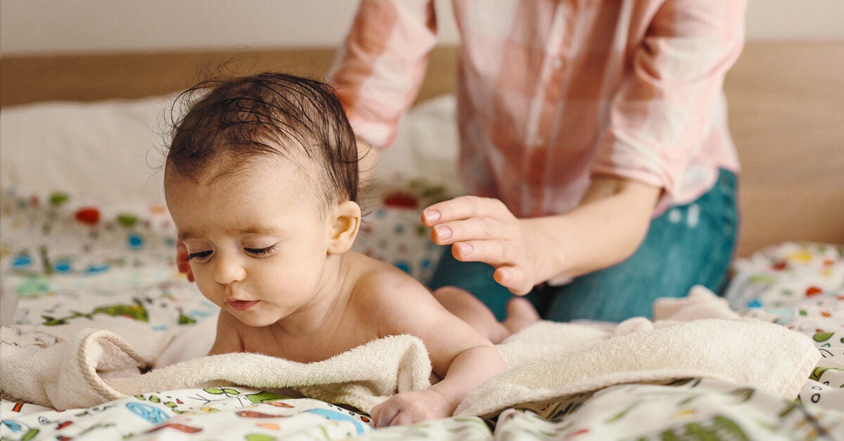 mother_giving_baby_a_massage-1200x628-facebook-1200x628.jpg